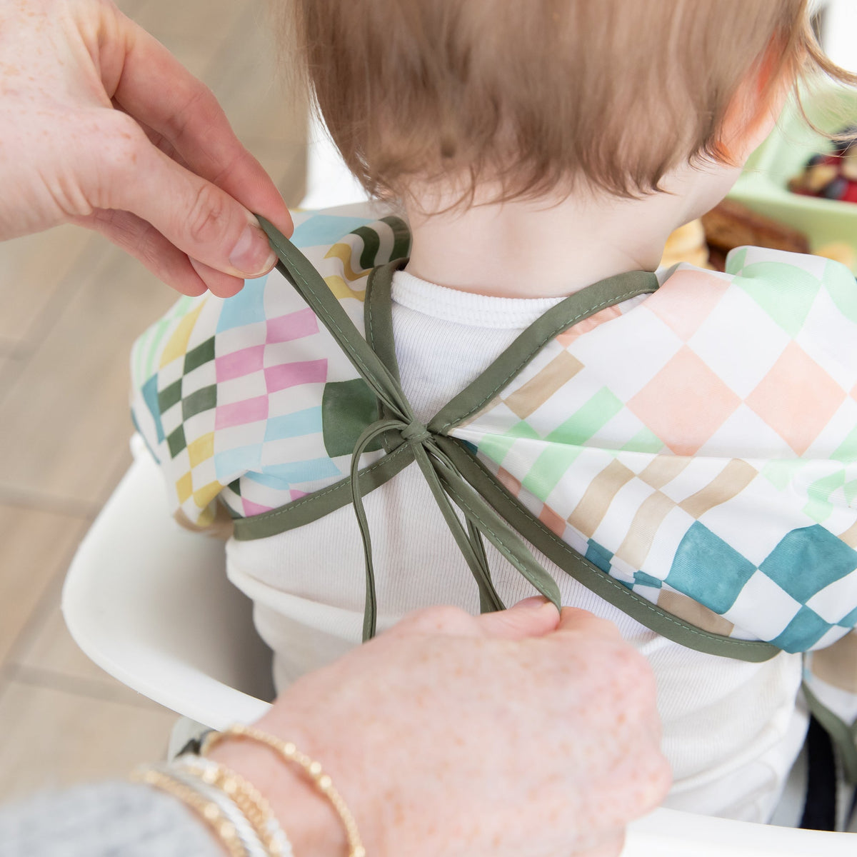 Motley Check Sleeved Bib | Waterproof, Reusable | Bumkins