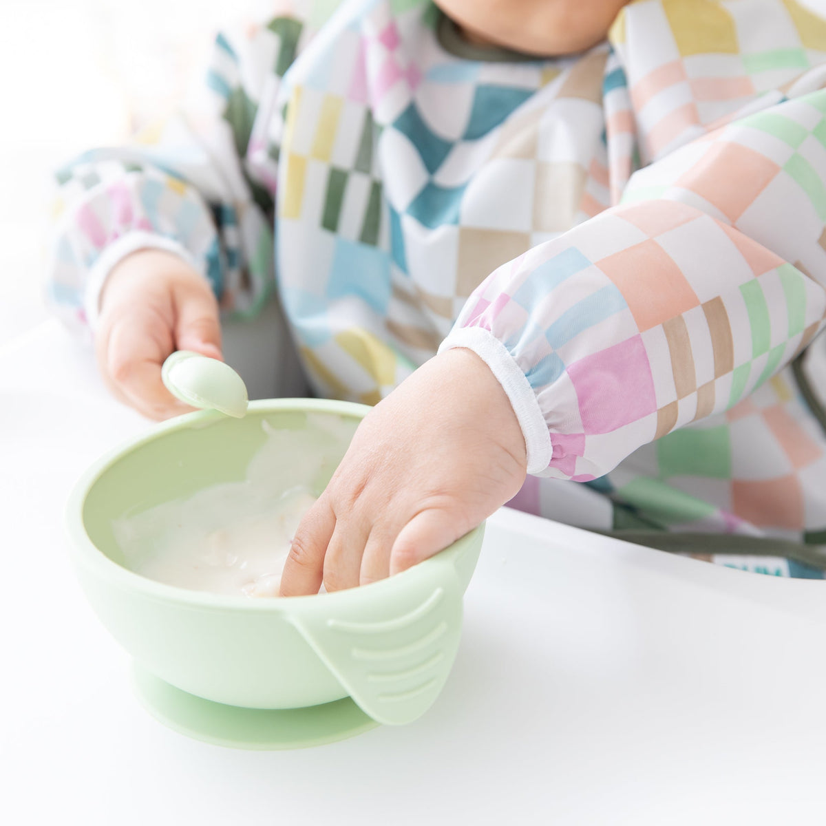 Motley Check Sleeved Bib | Waterproof, Reusable | Bumkins